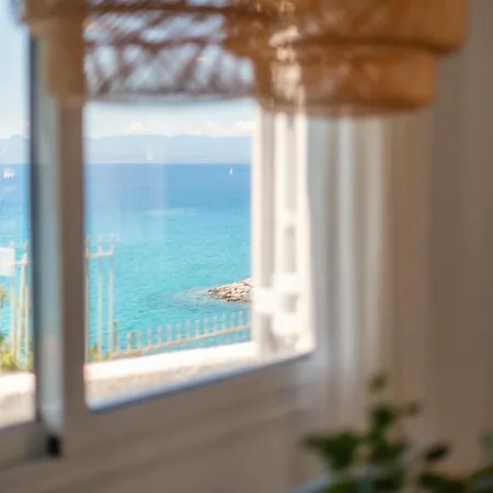 Pouletis Family - Akroyali Seaview Getaways *